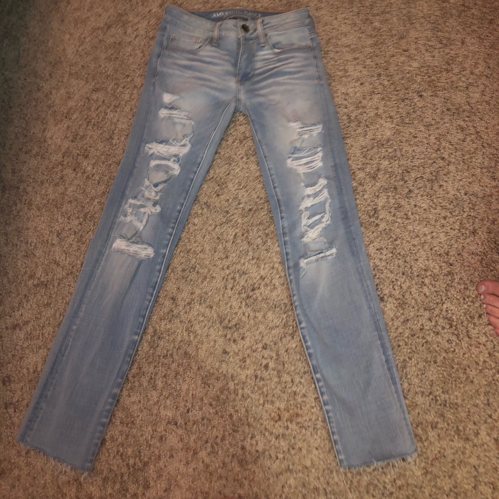 High rise skinny jeans with rips